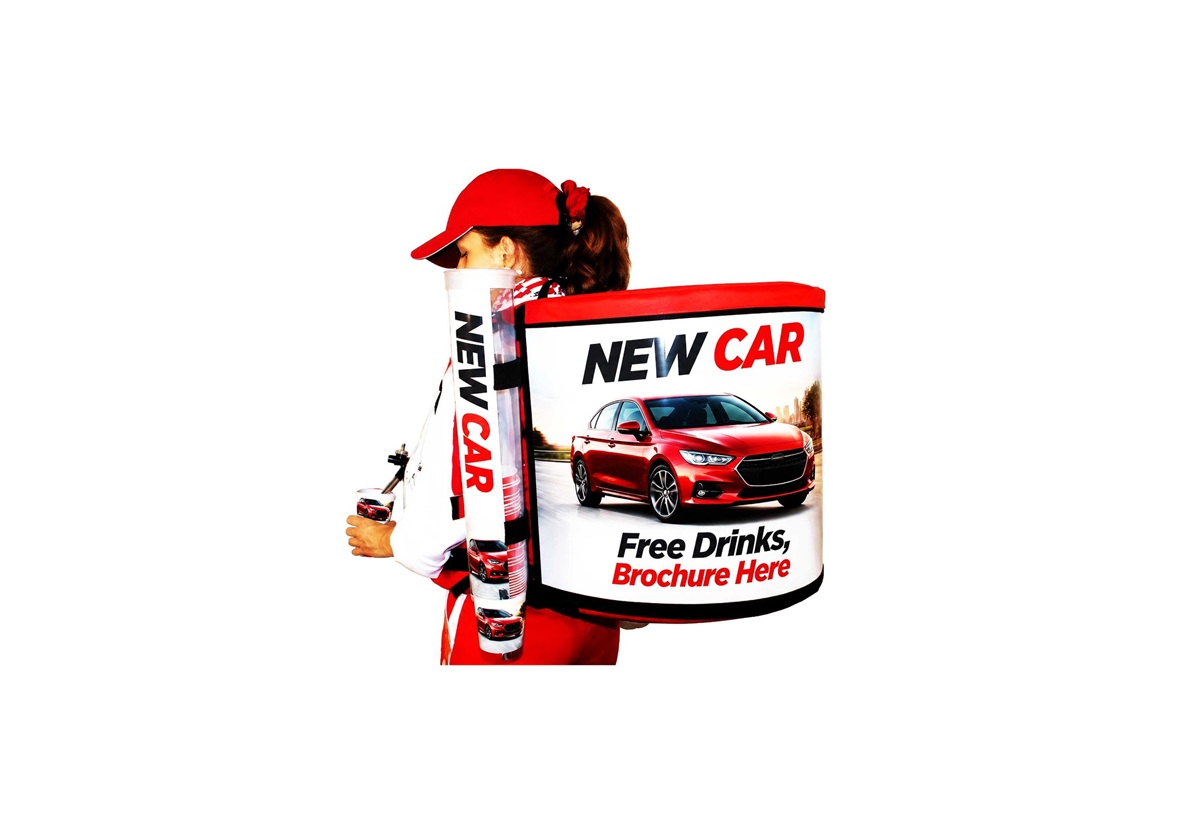Promoter wearing a branded automotive promotion and sampling backpack for mobile marketing campaigns