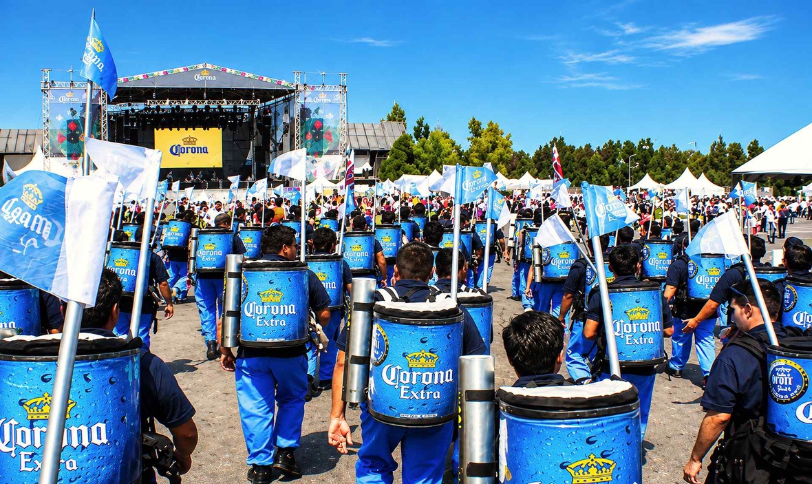 Mobile beverage vendors with backpack drink dispensers at a large even