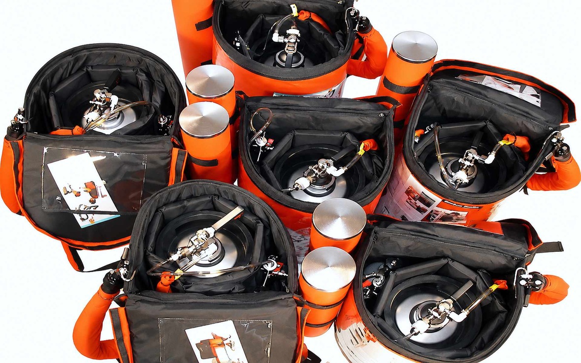 Multiple Beer Backpack Premium 11L systems showing stainless steel kegs, CO2 connections and professional mobile beer dispensing equipment