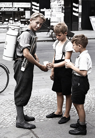 Historic lemonade vendor with a backpack drink dispenser in Berlin in 1931